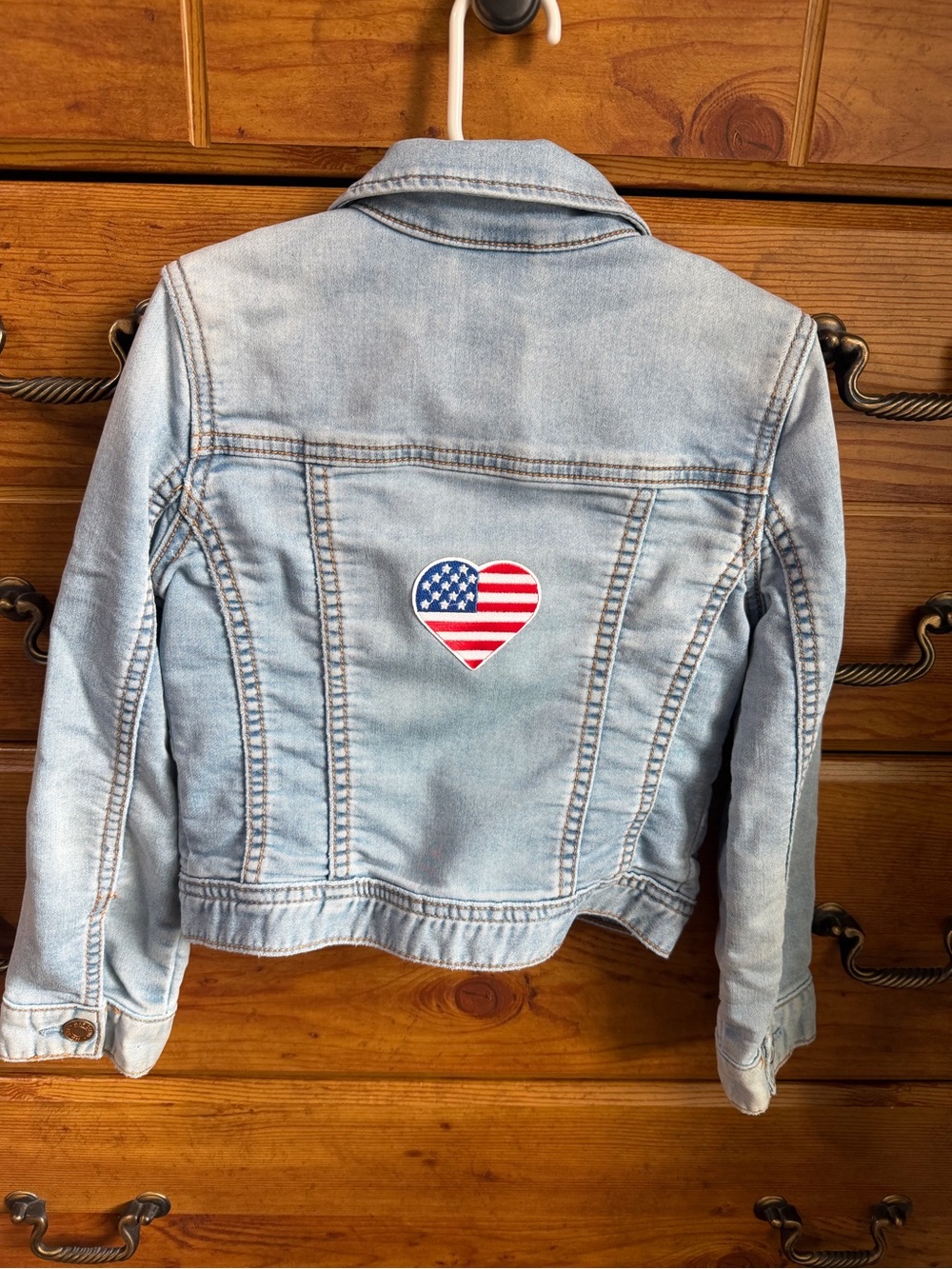 Girls Gap soft/stretchy jean jacket with patriotic heart on back size S